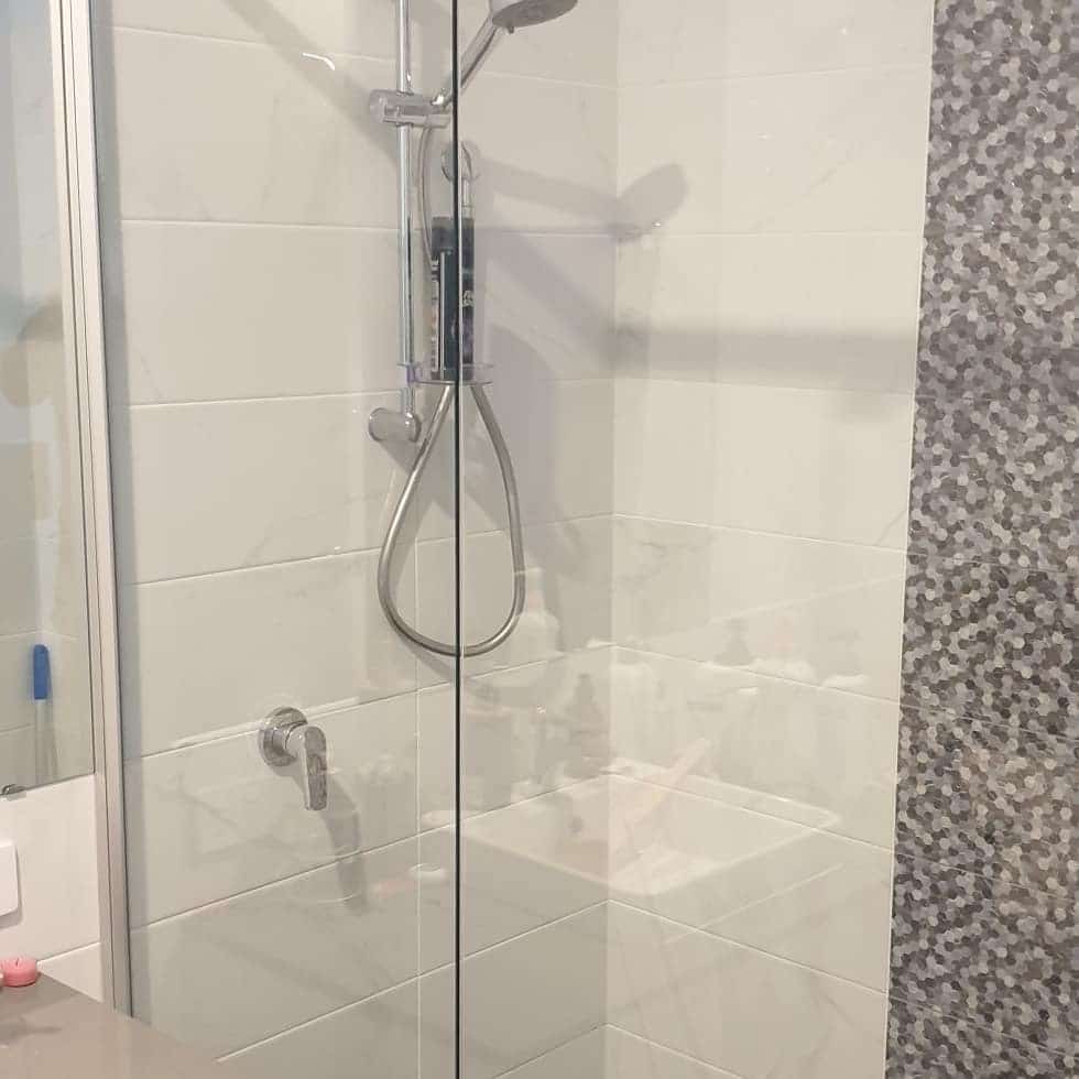 Treated shower screen